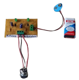 Circuit diagram of a classic 555 timer Astable Multivibrator showing resistors, capacitors, and output waveform.