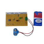 Electronic schematic of a NOT gate using an NPN transistor, showing input, output, and resistor configuration.