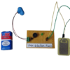 Circuit diagram of a DIY rain alarm project using a rain sensor, NPN transistor, and buzzer to detect water droplets.